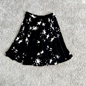 LuLaRoe Madison Skirt size small black with white stars.